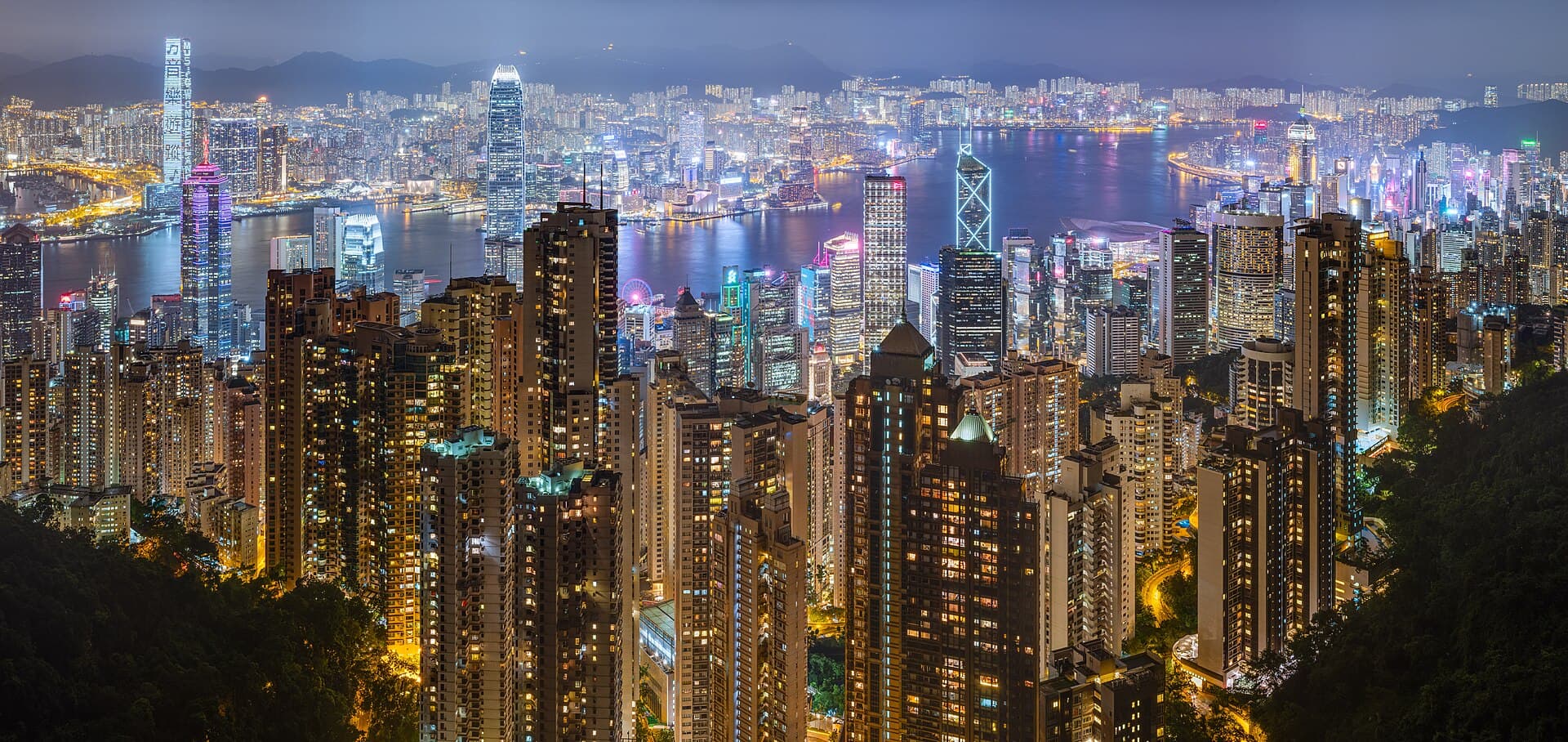 Hong Kong harbour skyline illuminated at night